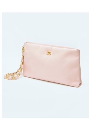 Light pink Pouch with handle in lambskin leather. Luxury designer pouch with gold-tone metal details. Chic pink lambskin pouch with structured silhouette. Elegant small pouch with handle for women. Soft lambskin clutch with gold-tone accents. Stylish designer wristlet in light pink. Compact leather pouch with zip closure. High-end gold-accented pouch for evening wear. Classic CHANEL-inspired lambskin pouch. Timeless pink pouch for everyday essentials. Luxury small handbag with soft leather finish. Chic light pink wristlet with a secure zip. Minimalist designer pouch for fashion-forward women. Versatile leather pouch with gold hardware. Elegant pink clutch bag with handle attachment.