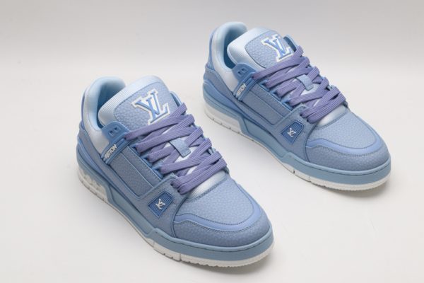 A pair of light blue Louis Vuitton LV Trainer Low-Top Sneakers