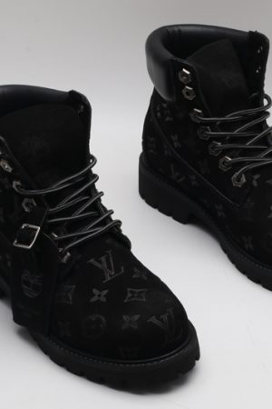 A single black Timberland x Louis Vuitton collaborative waterproof boot